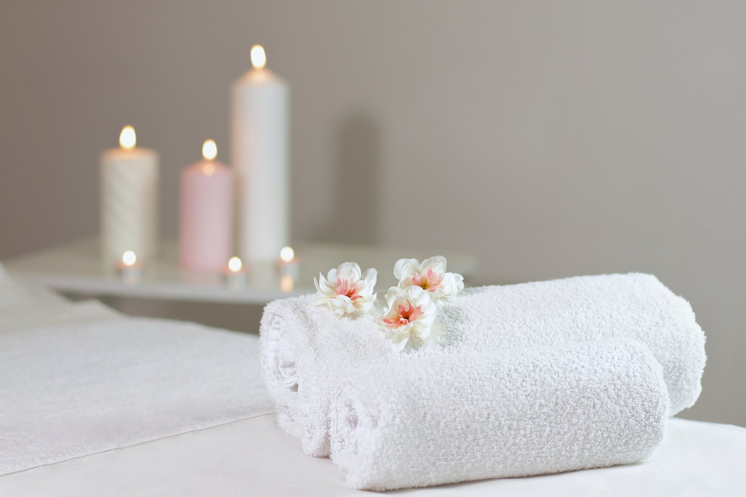 Spa Massage Table with Towels and Candles